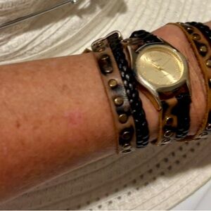 Calling cowgirls - fun wrap around Geneva Platinum faux leather studded watch.